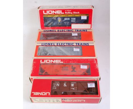 Five Lionel goods wagons: N AND W hopper 9111; Morton Salt 9114; CP bunk car 6-5728; IC covered hopper 6-9264; Pennsylvania c