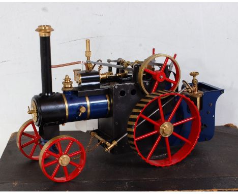 A Mercer of Birmingham 3 1/4" scale spirit fired live steam traction engine, comprising blue body with brass detailing and re