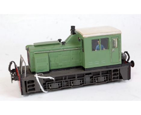 Atlas 0-6-0 diesel shunter light green on black base with white cab roof, buffer beams repainted (G)