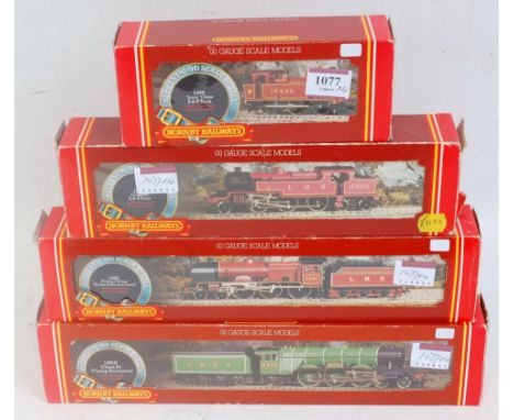 4 Hornby steam engines R055 2_6-4 tank, R301 Jinty tank R311 'Duke of Sutherland' engine and tender all LMS red and R398 LNER