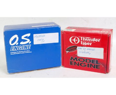 Two boxes containing a quantity of high performance aircraft engines and accessories, to include an MDS 40 engine and silence