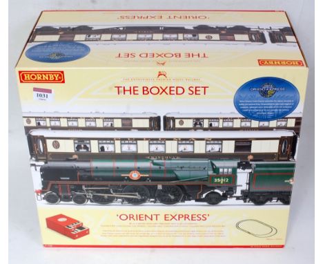 A Hornby R1038 "Orient Express" the boxed set containing "United States Lines" Merchant Navy class engine and tender, 3 light