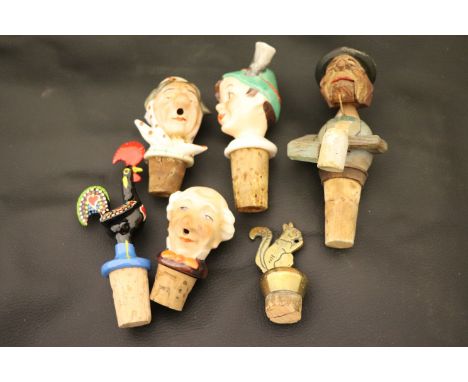 Group of six vintage Bottle stoppers to include ceramic and wood examples