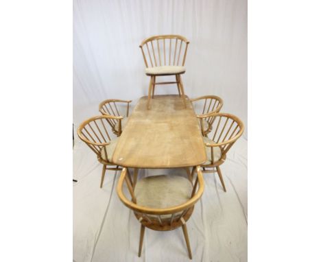 Ercol Pale Elm Dining Suite comprising Pale Elm Dining Table raised on four square tapering legs and Six Ercol ' Cowhorn ' Di