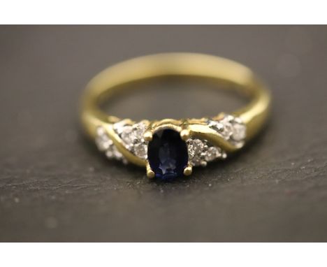 Fully hallmarked 18ct gold diamond and sapphire ring