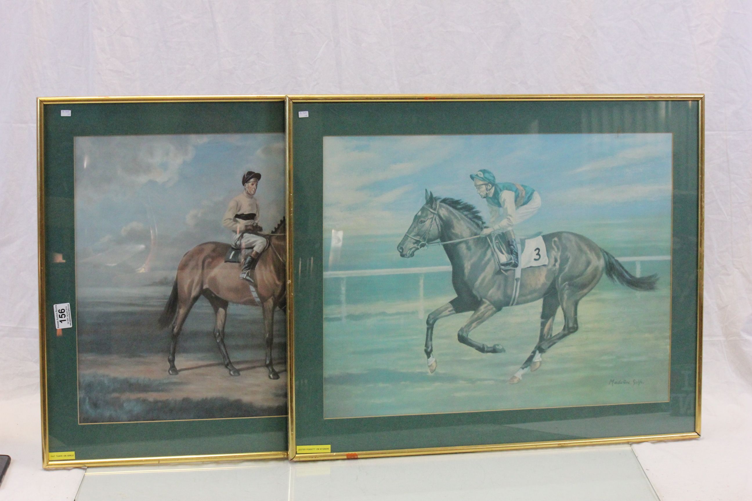 A pair of gilt framed horse racing prints of famous horses Arkle and