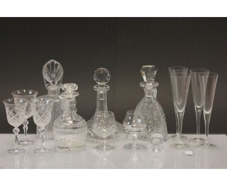 Two cut glass decanters a similar ships decanter and a quantity of glasses etc.