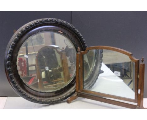 An oak antique swing mirror and a oval  wall mirror 