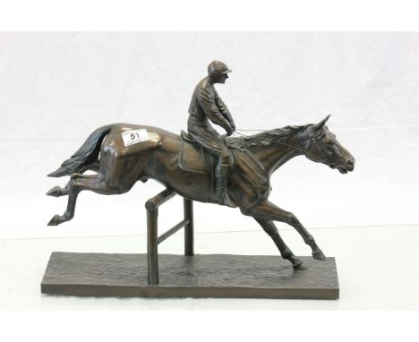 Large bronzed effect model of a Jockey on Racehorse
