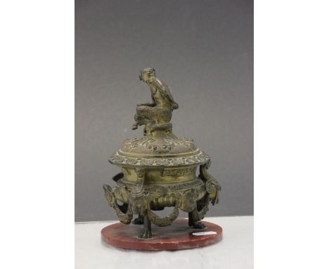 Large 19th Century ornate gilt Bronze inkwell with glass liner and Pan finial to lid