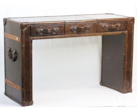 Reproduction Antique Vanity Desk finished in the form of a Brown Leather Steamer Trunk, the central compartment lifting to re