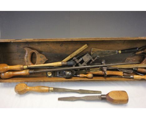 Wooden tray containing a quantity of vintage tools featuring plane, chisel etc