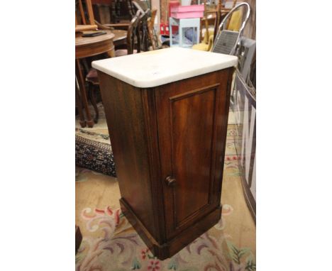 Victorian Oak Pot Cupboard having a Marble Top with a single internal shelf raised on a plinth base