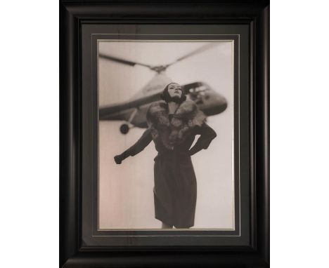 20th/21st CENTURY SCHOOL, 'Woman with Sikorsky Helicopter', photo-print, 69cm x 48cm. 