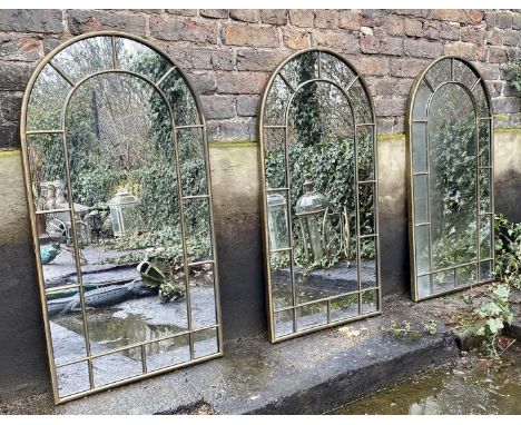 ARCHITECTURAL WALL MIRRORS, a set of three, 107cm x 55cm, bronzed finish frames. (3) 