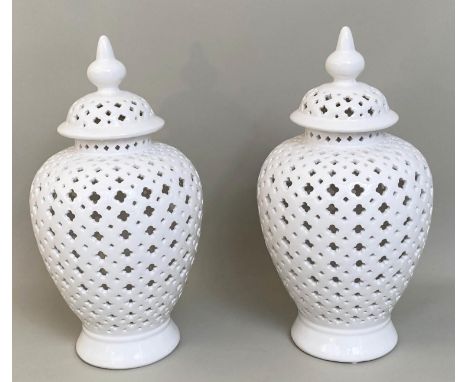 GINGER JARS, a pair, 49cm x 25cm, pierced white glazed ceramic. (2) 