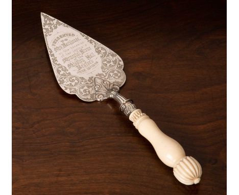 Late Victorian silver engraved presentation trowel with decorative turned and carved ivory handle inscribed: “Presented to Mr