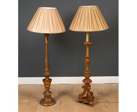 A carved giltwood floor lamp, 100cm high together with a further carved wood standard lamp, 110cm high

Will need rewiring, g