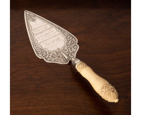 Late Victorian silver engraved presentation trowel with very decorative turned and carved ivory handle with acanthus crown po