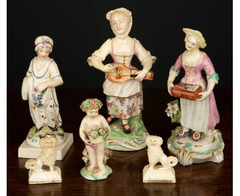 A collection of ceramic figurines, comprising 3 female figures, one playing the hurdy gurdy, 16cm high, a Derby boy figurine 