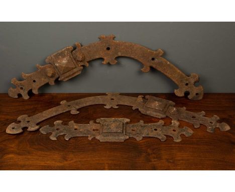 A set of three antique strapwork architectural door ornaments consisting of two curving sections and one straight, the curvin