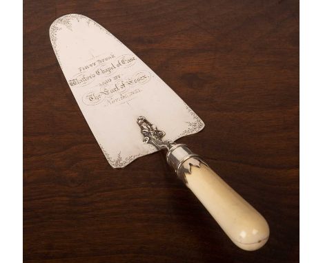 A Victorian silver engraved presentation trowel with simple turned ivory handle and decorative silver ferrule inscribed: “Fir