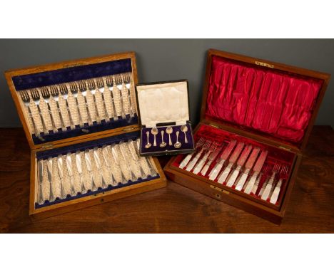A set of six silver teaspoons, cased, together with a partial set of twelve silver plated mother of pearl handled knives and 