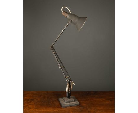 A 20th century Herbert Terry Anglepoise lamp in black with a 2 step base.lamp will need rewiring, minor surface marks. mechan