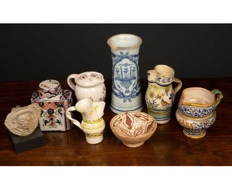 A mixed group of china to include a Dutch delft tea caddy, 9cm wide x 12cm high; a Delft vase, 19cm high; two continental tin