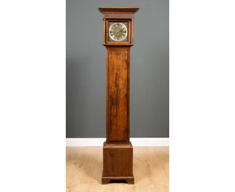 An early 20th century mahogany cased Grandmother clock the brass and silvered dial with Arabic and Roman numerals, unsigned, 