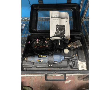A boxed Power Craft combination tool 