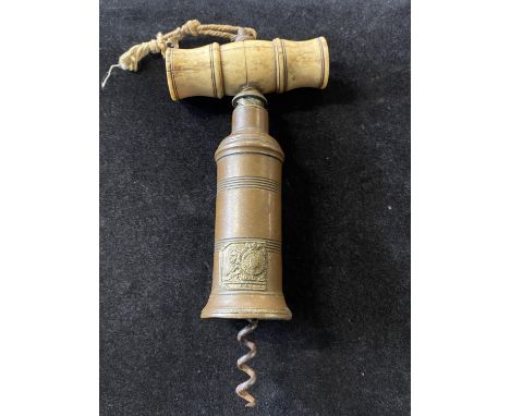 A antique Georgian corkscrew. A/F 