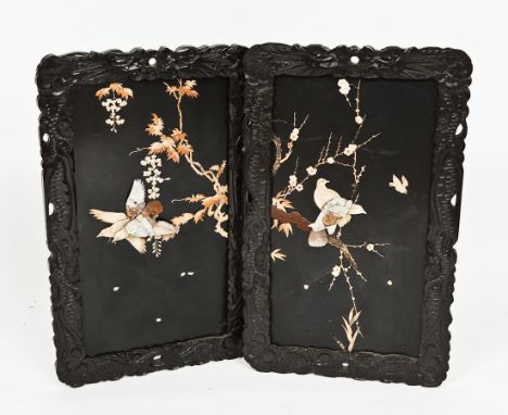 PAIR OF CHINESE LACQUERED CARVED WOOD PANELS
with ivory and mother of pearl inlaid birds among foliate motifs, with carved wo