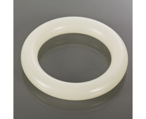 CHINESE JADE BANGLE
of a single tick band, in pale/white jade 