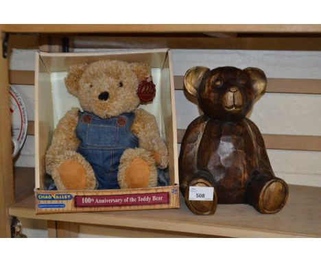 A Chad Valley 100th Anniversary teddy bear and a carved wooden teddy bear