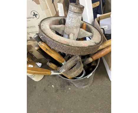 Bucket of assorted gardening tools