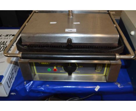 A caterers roller grill sandwich toaster