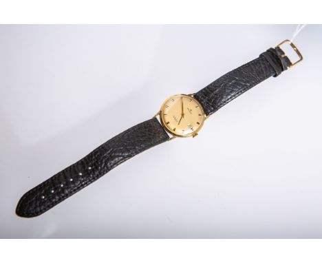 Herrenarmbanduhr 750 GG "Golana 17 Jewels Incabloc" (Golana, wohl 1950/60er Jahre),goldfarbenes Zifferblatt m. schwarz/golden