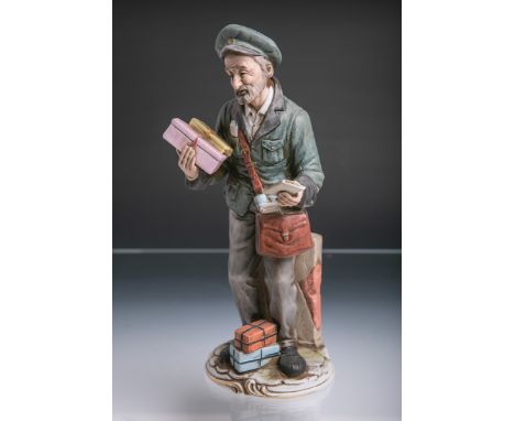 Porzellanfigur "Briefträger" (Merli, B.), polychrom bemalt, m. Briefen u. Päckchen, H. ca.29 cm. Unbeschädigt.