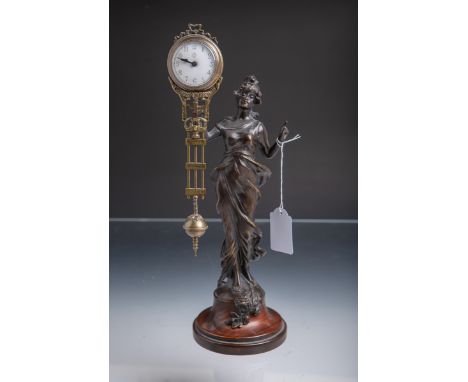 Schwingpendeluhr "Mysterieuse" (Jugendstil, 19./20. Jh.), wohl Messing bronziert m. Tropenholzsockel, Uhr an figürlicher Dame