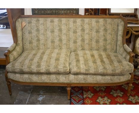 CANAPE, 171cm x 107cm H, circa 1880, French beechwood with a carved frame and animal print fabric. 