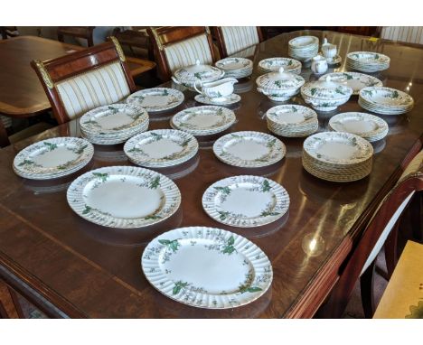 DINNER SERVICE, Royal Worcester Valencia including tureens and assorted plates, decorated with white flowers and leaves. (Qty