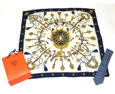Hermes Silk Scarf 'Les Clefs' Design on cream with a navy border; and a Hermes Silk Tie on light blue silk, depicting roostin