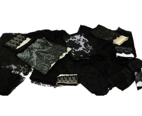 Assorted 19th/20th Century Black Lace, comprising six lace and beaded long shawls; two stoles; large panel; flounces, a Chant