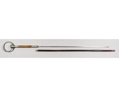 A Victorian Sword Stick, in the form of a military swagger stick, silvery coloured metal pommel marked with V crown and R, wi