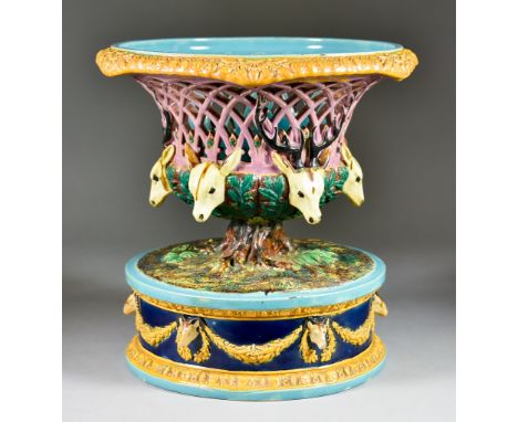 A Continental Majolica Table Centrepiece of Large Proportions, with pierced bowl and alternate stag and doe head and leaf dec