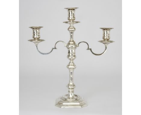 An Elizabeth II Silver Three Light Candelabra, by Atkin Bros., Sheffield 1953 and 1954, of 18th Century design, the octagonal