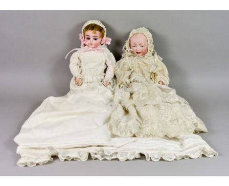 Four Bisque/Bisque-Headed Dolls, Late 19th/Early 20th Century, two possibly by Hertel &amp; Schwab, one 10ins high, with leat