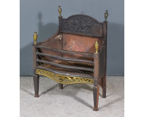 A Brass and Cast Iron Serpentine Fronted Fire Grate, 19th Century, with baluster turned finials, the back cast with urn and w