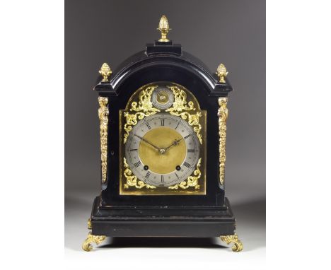 A Late 19th Century Ebonised Cased Mantel Clock by Winterhalder and Hofmeier, the 6.5ins arched brass dial with silvered chap